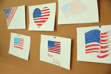 Canvas Print - Child's drawings of American flag on cork board