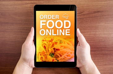 Poster - Two hand holding tablet with Order food online and icon on scree