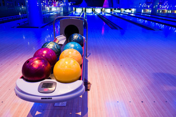 Colorful bowling balls in beautiful light indoor