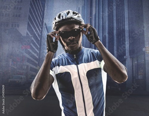 Fotografie, Tablou Composite image of cyclist is posing
