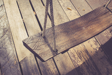 old rustic natural wood swing