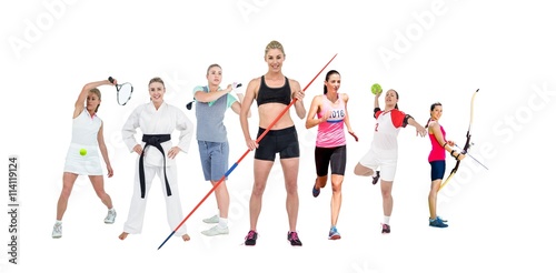Fotografiet Composite image of sportswoman practicing archery