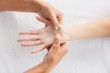 © WavebreakMediaMicro - Cropped image of masseur massaging woman hand