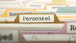File Folder Labeled as Personnel in Multicolor Archive. Closeup View. Blurred Image. 3D Render.