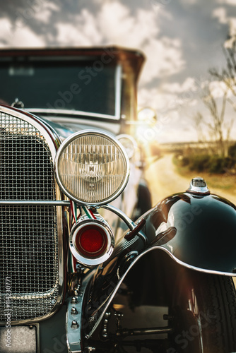Traveling on an old car 20s © StockPhotoPro