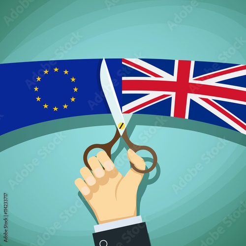 Fotografia, Obraz Human hand with scissors cuts the flags of Great Britain and the