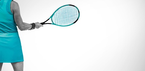 Composite image of athlete playing tennis with a racket 