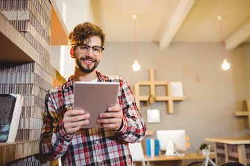 Poster - Portrait of graphic designer using digital tablet