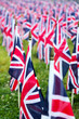 British United Kingdom UK Flags in a row with front focus and the further away symbols blurry with bokeh. The flags were set up on Memorial Day in DC.
