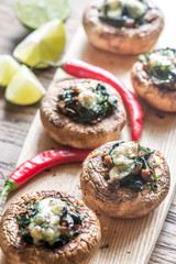 Wall Mural - Baked mushrooms stuffed with spinach and cheese