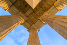 Symmetrical Ceiling At Top Corner Of Lincoln Memorial Roof During Early Morning DC Sunrise. The Columns And Marble Are Lit By The Sun And Cast Shadows. The Composition Utilizes Symmetry.