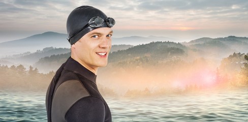 Poster - Composite image of close-up of confident swimmer in wetsuit