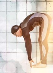 Poster - Composite image of swimmer in wetsuit preparing to dive