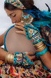 © zolotareva_elina - attractive young woman in ethnic jewelry close up portrait