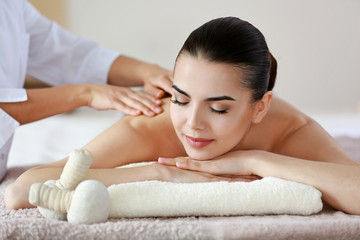 Canvas Print - Young woman having spa procedures at the beauty salon