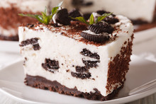 Cheesecake With Pieces Of Chocolate Cookies Macro. Horizontal
