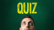 © gustavofrazao - Guy Looking Ahead in a Chalkboard with the text: Quiz