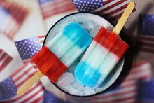 Red white blue popsicles / American flag colored popsicles, selective focus