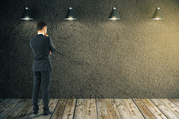 Poster - Businessman looking at blank wall