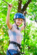 © davit85 - adventure climbing high wire park - people on course in mountain