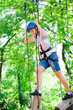 © davit85 - adventure climbing high wire park - people on course in mountain