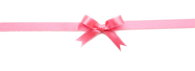 Wall Mural - Pink ribbon bow on white background