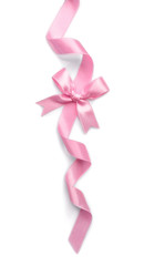 Pink ribbon with bow on white background