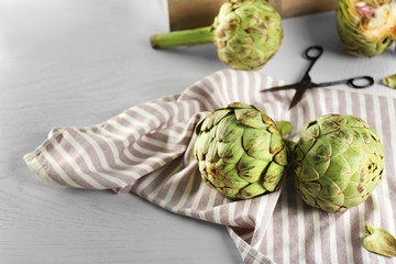 Wall Mural - Artichokes on light background