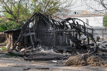 burned house after a fire in the city