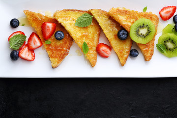 Wall Mural - french toasts with fresh summer berries