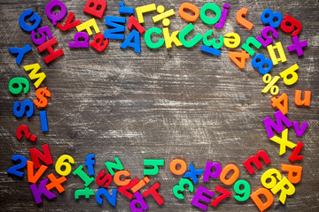 Border of colorful  letters and numbers.