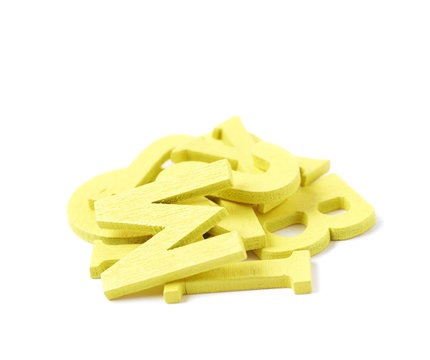 Pile of painted wooden letters isolated