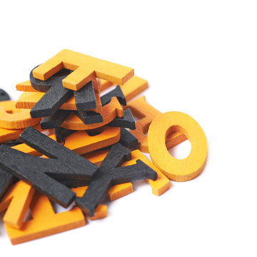 Pile of painted wooden letters isolated