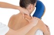 © WavebreakMediaMicro - Cropped image of masseuse giving back massage to woman