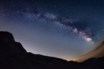 Wall Mural - the outstanding beauty of the milky way arc and the starry sky captured at high altitude in summerti