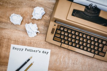 Wall Mural - Happy fathers day written on paper