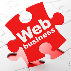 Web development concept: Web Business on puzzle background