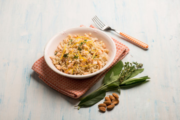 Canvas Print - risotto with fresh salmon almond and lemon peel