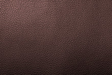 Closeup Red Brown Leather Texture For Design. Leather Background With Copy Space For Text Or Image.