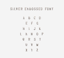 Silver embossed alphabet isolated, 3d illustration. Argent typing font design. Beveled symbols embossing on plastic card. Hammering chamfer type letters text. Grunge metallic lettering emboss fount