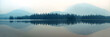Leinwandbild Motiv Foggy mountain lake