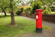 © Jillian Cain - Victorian red post box on a residential tree lined street in Wilmslow, United Kingdom