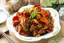 Spicy Chinese Braised Pork On White Plate