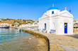 A typical white church in Mykonos fishing port, Cyclades, Greece