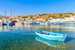 Typical blue and white color Greek fishing boat in Mykonos port on island of Mykonos, Cyclades, Greece