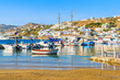 Typical colorful Greek fishing boats in Mykonos town port on island of Mykonos, Cyclades, Greece