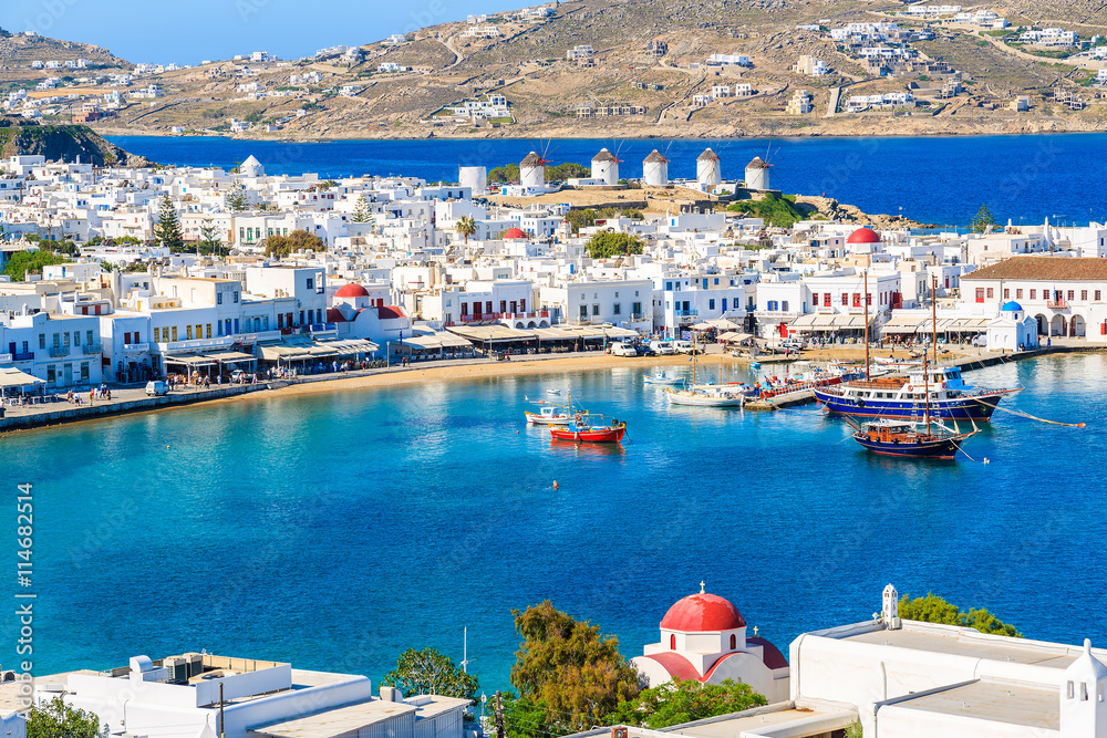 A view of Mykonos port with boats, Cyclades islands, Greece - obrazy, fototapety, plakaty 