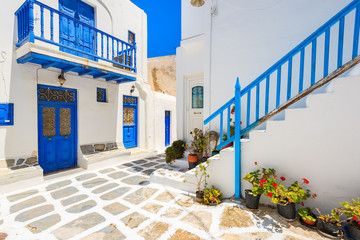 Naklejka na meble A view of whitewashed street with typical Greek architecture in beautiful Mykonos town, Cyclades islands, Greece