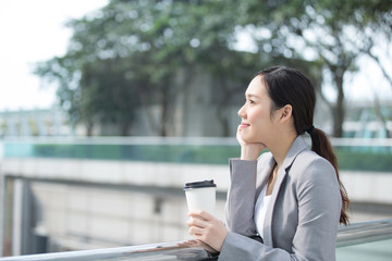 Sticker - business woman with coffee cup