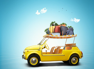Wall Mural - tourism and travel, a small yellow car with luggage